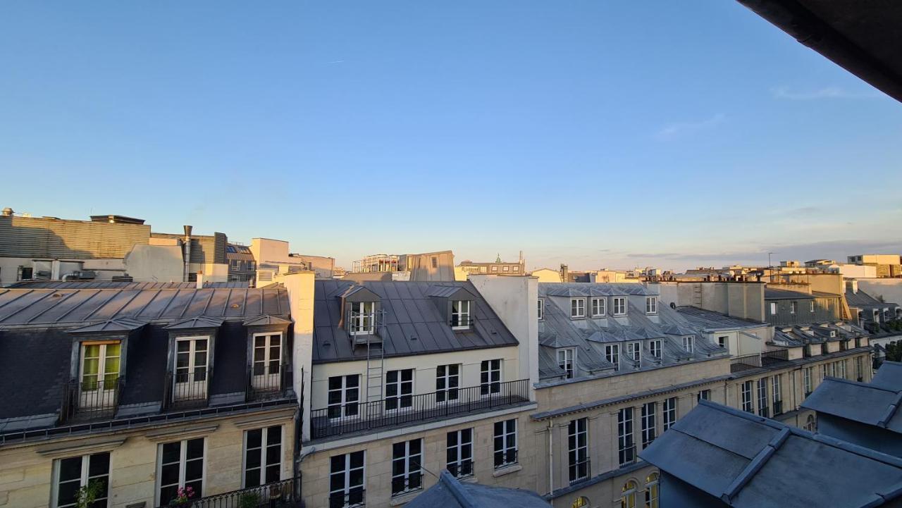 Appartement Coeur De Paris Avec Vue Sur Les Toits Luaran gambar